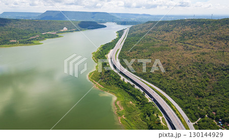 Drone shot The M6 motorway Nakhon Ratchasima Province - Bang Pa-in Lam Ta Khong River and Mountain. Motorway Korat Thailand 130144929