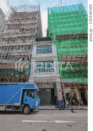 Aug 23 2025 a Urban Construction Scene with Bamboo Scaffolding 130146169