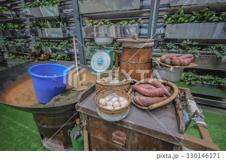 Aug 23 2025 Rustic Farmers Market Display with Vintage Tools and Fresh Produce 130146171