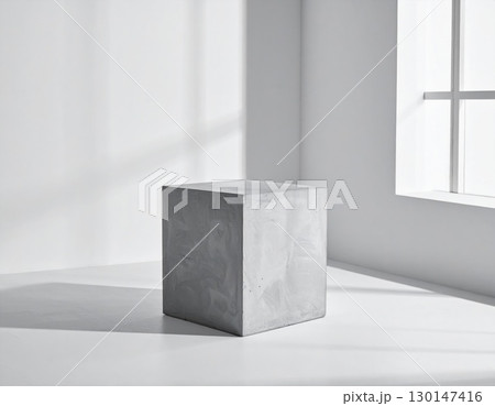 Gray Concrete Cube Centered in Minimalist White Room Near Window Gray Concrete Cube Centered in Minimalist White Room Near Window 130147416