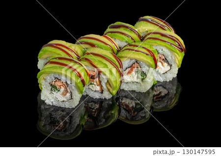 Fresh sushi rolls with salmon, cream cheese, cucumber and avocado topping with sauce Fresh sushi rolls with salmon, cream cheese, cucumber and avocado topping with sauce 130147595