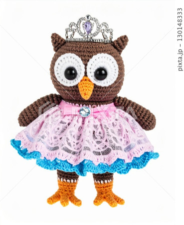 Crocheted Owl Toy with Tiara and Pink Dress on White Background 130148333