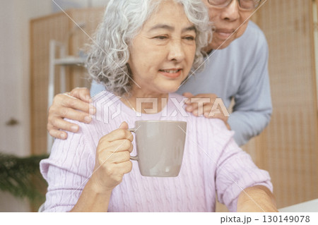 senior couple and documents with laptop for finance, budget planning or retirement annuity on sofa. Elderly man, woman or house with smile, computer or paperwork for pension fund or insurance senior couple and documents with laptop for finance, budget planning or retirement annuity on sofa. Elderly man, woman or house with smile, computer or paperwork for pension fund or insurance 130149078