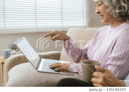 senior couple and documents with laptop for finance, budget planning or retirement annuity on sofa. Elderly man, woman or house with smile, computer or paperwork for pension fund or insurance senior couple and documents with laptop for finance, budget planning or retirement annuity on sofa. Elderly man, woman or house with smile, computer or paperwork for pension fund or insurance 130149103