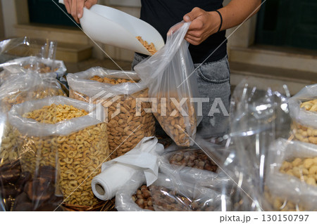 Shopping Almonds for Healthy Snacks at a Local Market Shopping Almonds for Healthy Snacks at a Local Market 130150797