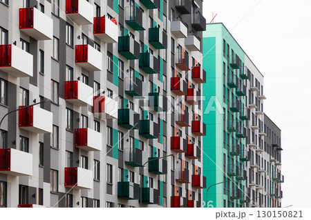 Modern high-rise apartment buildings with colorful balconies in a residential area suitable for rent Modern high-rise apartment buildings with colorful balconies in a residential area suitable for rent 130150821