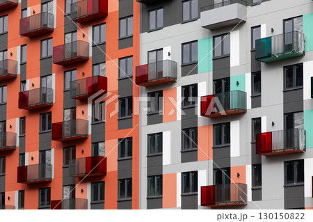 Modern high-rise apartment buildings in a vibrant residential area focused on rent, mortgages, and 130150822