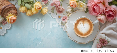 Elegant Coffee and Croissant with Floral Arrangement 130151193