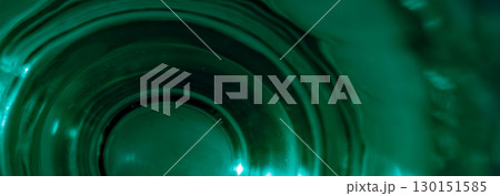 Horizontal background with a teal illuminated glass texture, perfect for cutting-edge designs 130151585