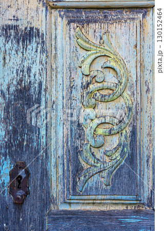 Old carved wooden church door Old carved wooden church door 130152464