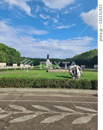Berlin, Germany - August 1, 2025: The Soviet War Memorial, a war memorial and military cemetery in Berlin's Treptower Park. It was built to the design of the Soviet architect Yakov Belopolsky Berlin, Germany - August 1, 2025: The Soviet War Memorial, a war memorial and military cemetery in Berlin's Treptower Park. It was built to the design of the Soviet architect Yakov Belopolsky 130152923