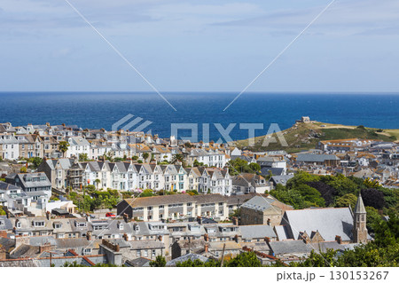 St Ives, Cornwall coastal townscape with harbour, rooftops and blue Atlantic horizon 130153267