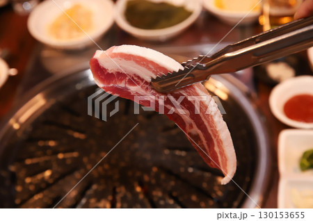 Korean BBQ. Charcoal grilled pork belly Korean BBQ. Charcoal grilled pork belly 130153655