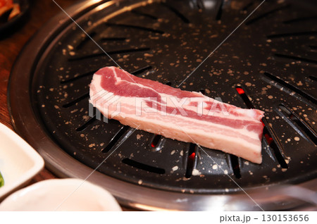 Korean BBQ. Charcoal grilled pork belly Korean BBQ. Charcoal grilled pork belly 130153656