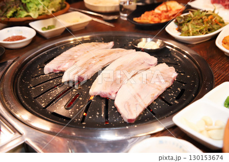 Korean BBQ. Charcoal grilled pork belly Korean BBQ. Charcoal grilled pork belly 130153674