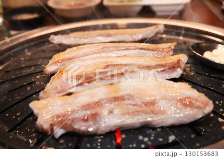 Korean BBQ. Charcoal grilled pork belly Korean BBQ. Charcoal grilled pork belly 130153683