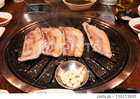 Korean BBQ. Charcoal grilled pork belly Korean BBQ. Charcoal grilled pork belly 130153685