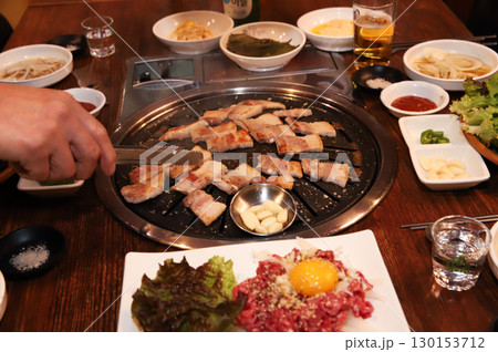 Korean BBQ. Charcoal grilled pork belly Korean BBQ. Charcoal grilled pork belly 130153712