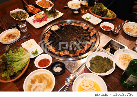 Korean BBQ. Charcoal grilled pork belly Korean BBQ. Charcoal grilled pork belly 130153750
