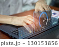 fast internet connection speedtest network bandwidth technology Man using high speed internet with smartphone and laptop computer. 5G quality, speed optimization.. 130153856