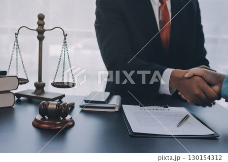 Lawyer explained to the client about the law that must be brought against the court case. 130154312