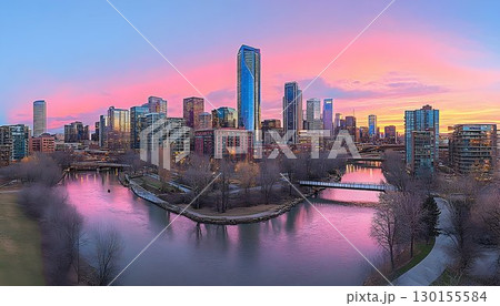 Calgary Skyline at Dusk: Pink Sky Reflects on Bow River 130155584