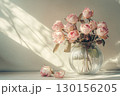 Soft Pink Roses in Glass Vase with Gentle Natural Lighting 130156205