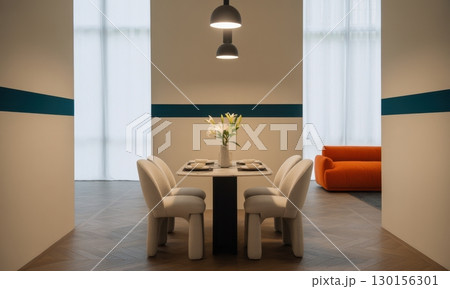 Minimalist dining room with sleek white marble table, four upholstered chairs, and modern pendant lights 130156301