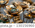 Metallic Flower Sculpture Representing Futuristic Technology and Innovation 130156960