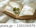 Vintage Open Book with Clover on Cotton 130156970