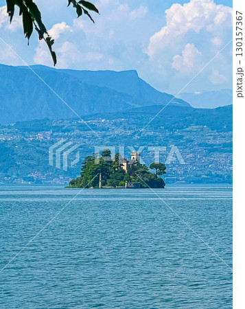 view of Loreto Island with the castle on Lake Iseo in Northern Italy 130157367