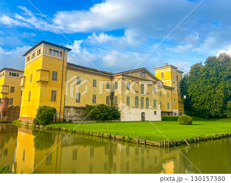 Villa Sommi Picenardi is immersed in the Cremona countryside, Italy in sunny day Villa Sommi Picenardi is immersed in the Cremona countryside, Italy in sunny day 130157380