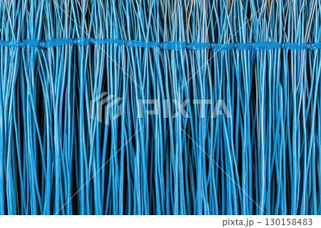 Vibrant blue synthetic threads woven tightly together create a striking visual pattern Vibrant blue synthetic threads woven tightly together create a striking visual pattern 130158483