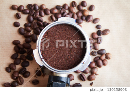coffee beans and coffee machine horn 130158908