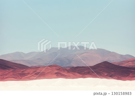 Unique landscape view of colorful hills and mountains under a clear sky in the daytime Unique landscape view of colorful hills and mountains under a clear sky in the daytime 130158983