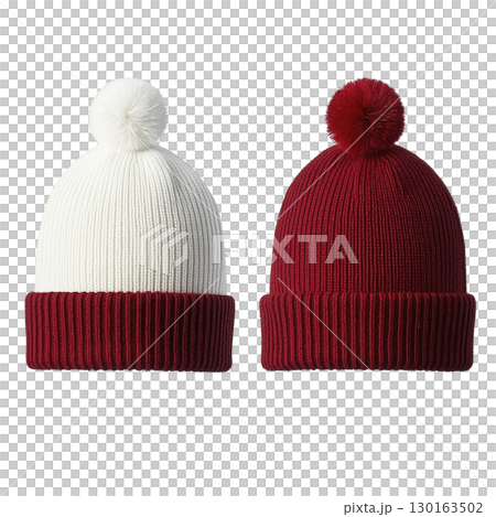A Two cozy knit beanies with pom poms, one in white and other in red, are displayed side by side. These winter accessories are perfect for keeping warm and stylish during cold weather 130163502