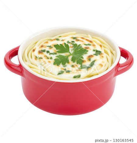 Delicious baked pasta dish in red casserole dish, topped with melted cheese and garnished with fresh parsley, creating warm and inviting meal 130163545