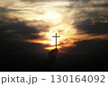 Black clouds, a red sun, and the cross of Jesus Christ, a Holy Week Easter background 130164092