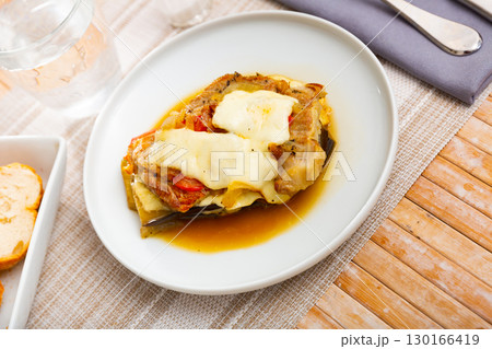 Eggplant with tomato, minced meat and cheese Eggplant with tomato, minced meat and cheese 130166419