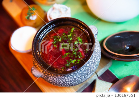 Russian borsch soup with meat and sour cream Russian borsch soup with meat and sour cream 130167351