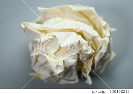 round lump paper on grey background, recycle used paper round lump paper on grey background, recycle used paper 130168235