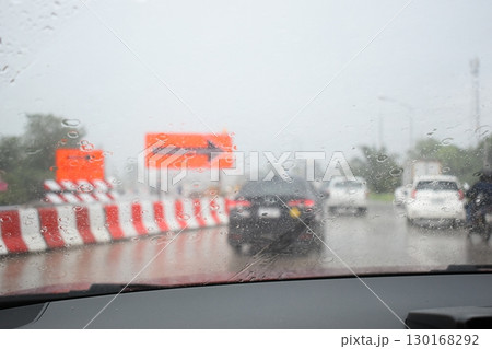 car on highway road with rainny season, blurred image car on highway road with rainny season, blurred image 130168292