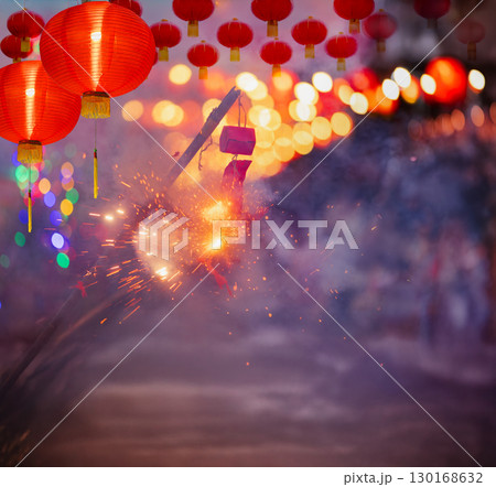 Traditional Chinese firecrackers are exploding with flashes and smoke in Lunar new year. 130168632
