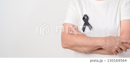 Elderly with Black ribbon for May Melanoma and skin cancer Awareness month, October Vaccine injury awareness month, Mourning Remembrance, March Sleep awareness week, Gang Prevention and Anti Violence Elderly with Black ribbon for May Melanoma and skin cancer Awareness month, October Vaccine injury awareness month, Mourning Remembrance, March Sleep awareness week, Gang Prevention and Anti Violence 130169564