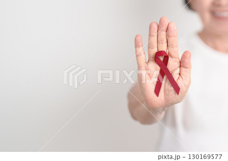 Elderly with Burgundy Ribbon for March Multiple Myeloma Cancer Awareness month, September Sickle Cell Anemia, Headache and Migraine week, April world Meningitis day, October Hospice Palliative care Elderly with Burgundy Ribbon for March Multiple Myeloma Cancer Awareness month, September Sickle Cell Anemia, Headache and Migraine week, April world Meningitis day, October Hospice Palliative care 130169577