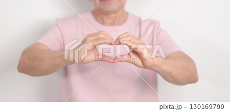 Elderly woman with pink Shirt for Pink October Breast Cancer Awareness month, May Women Health, women rights, Empowerment, March International Women day, February Valentine, May International Mother 130169790