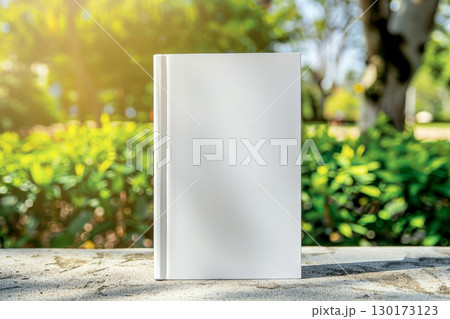 White book mock up, in warm and cozy natural light, generative AI 130173123