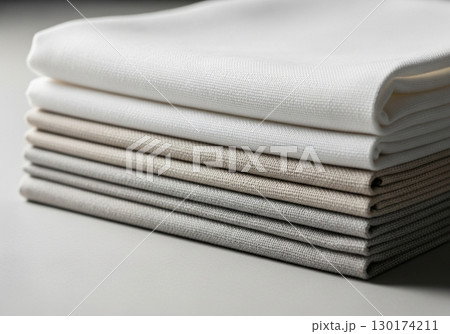 Stack of NeutralColored Fabric Swatches 130174211