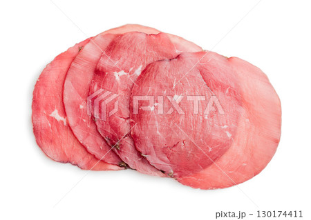 Slices of smoked bresaola isolated on white background. Slices of smoked bresaola isolated on white background. 130174411