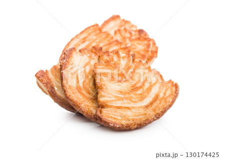 Le sfoglie. Crispy sweet pastry isolated on white background. Le sfoglie. Crispy sweet pastry isolated on white background. 130174425